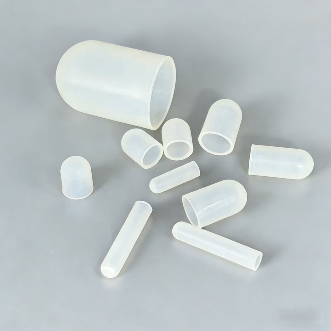 High temp silicone end caps for masking threaded studs