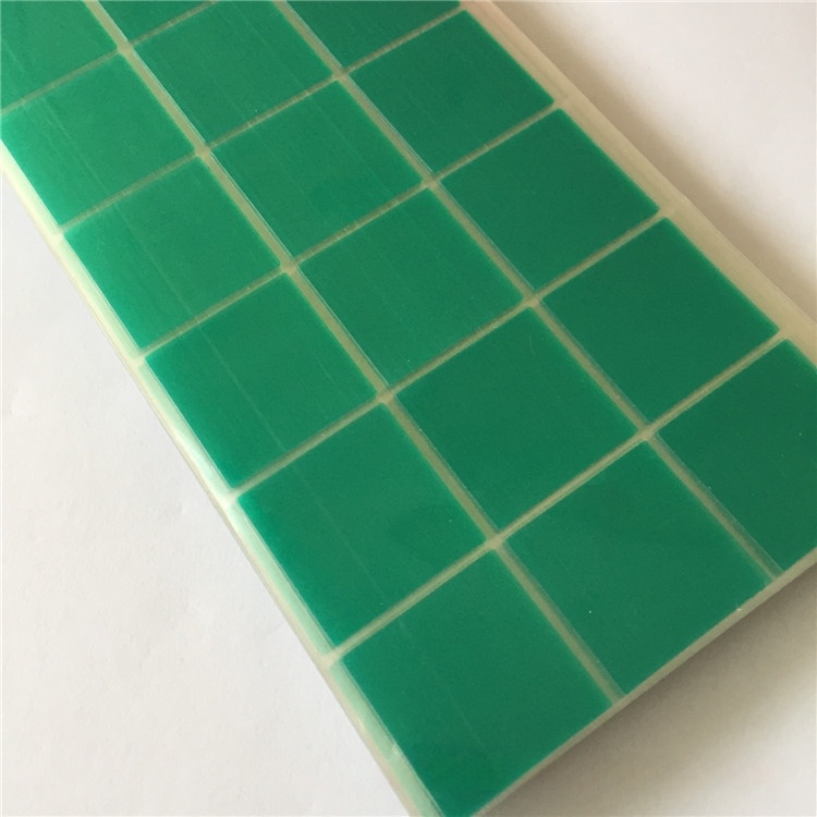 Green masking discs dots on clear liner roll